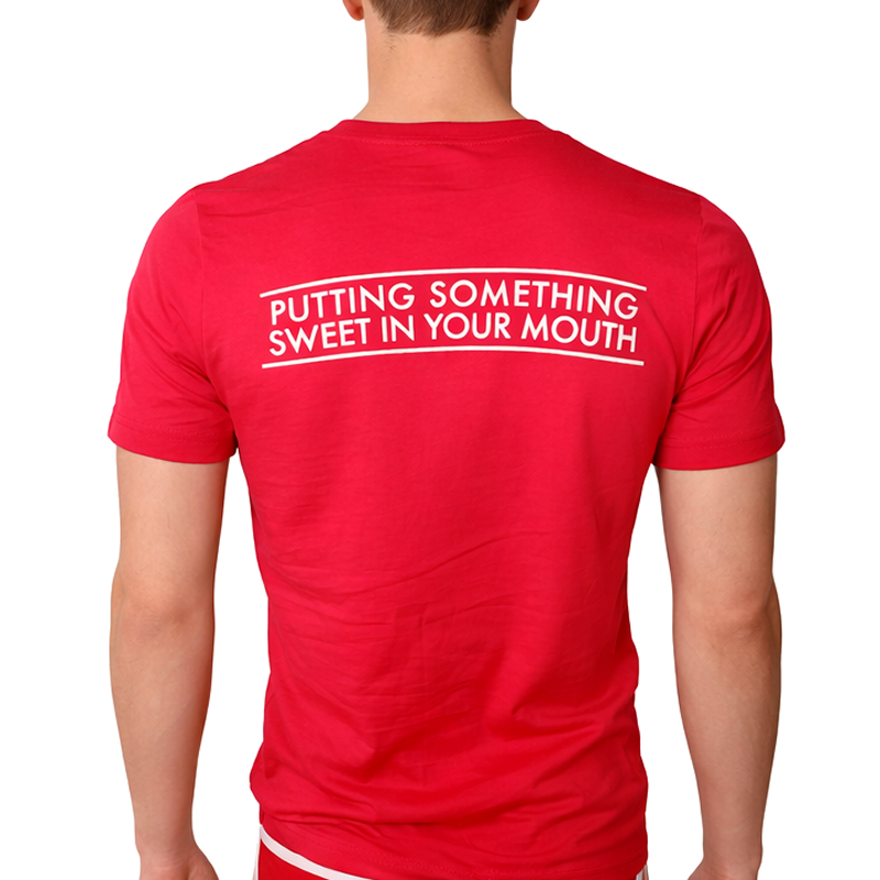 Back of the red HOT COOKIE T-Shirt with the slogan "Putting Something Sweet in Your Mouth" on it