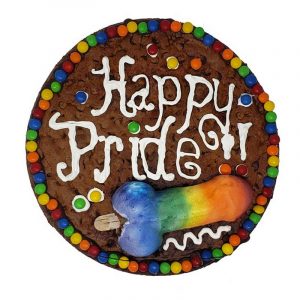 Cookie cake with Happy Pride message and a rainbow penis cookie topper